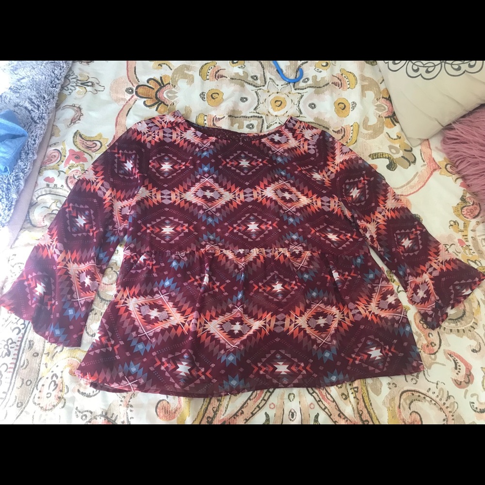 Aztec print peplum top with bell sleeves